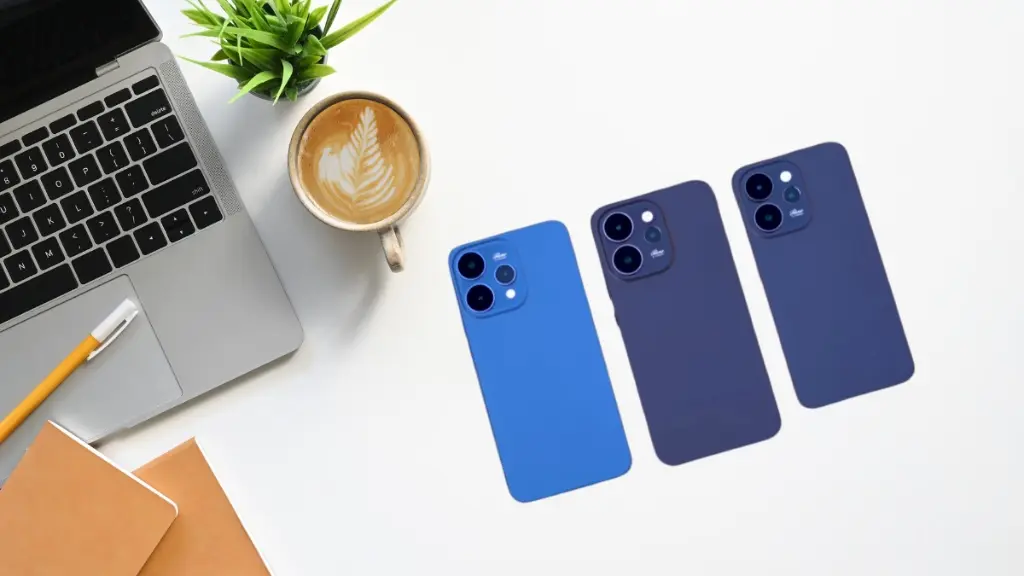Top view of Oppo Reno 15, 15 Pro and 15 Pro Mini smartphones on a white office desk with laptop and coffee